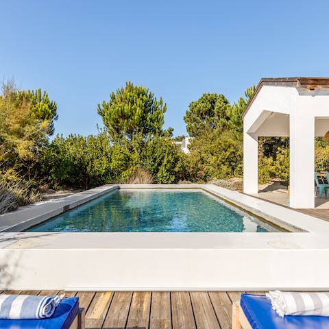 Jump into the swimming pool during sunny afternoons and dry off on a lounger