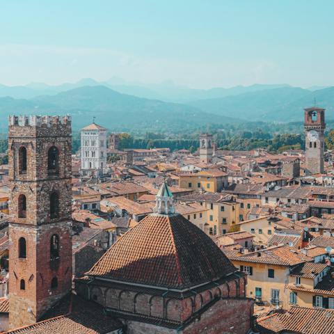 Head to the medieval town of Lucca, just a short drive down the hill