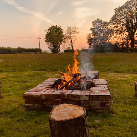 Gather around the fire pit to watch the sun go down
