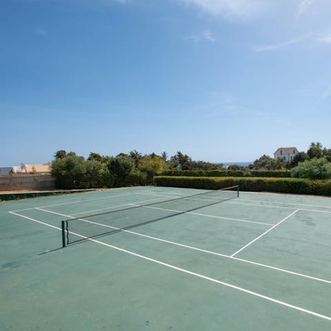 Play tennis with loved ones on the private court