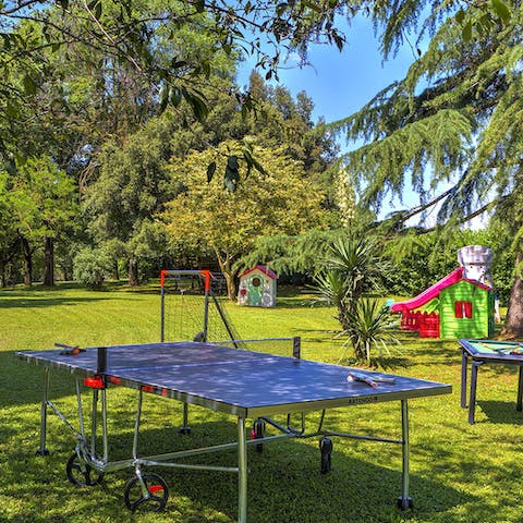 Play a game of table tennis in the children's section of the garden