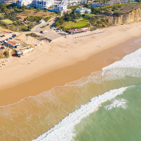Take the whole family down to the nearby Porto Mós Beach and soak up the sun