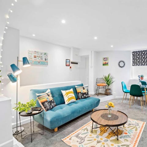 Take a moment to unwind in the comfortable living space with a glass of wine