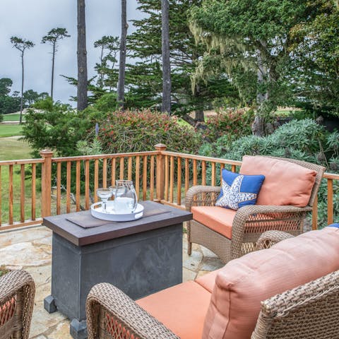 Relax on the flagstone patio with a glass of wine, admiring the views