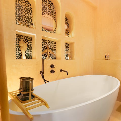 Enjoy a long soak in the freestanding bath tub