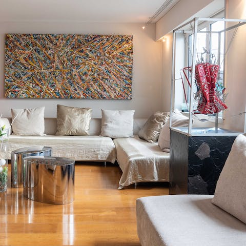 Unwind in the chic living space while taking in impressive modern artwork
