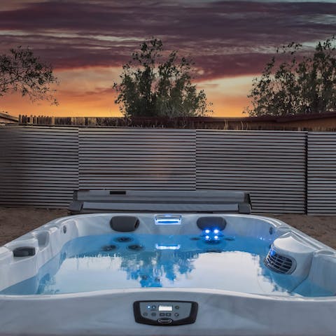 Look forward to easing tired muscles in the hot tub after long hikes through the desert