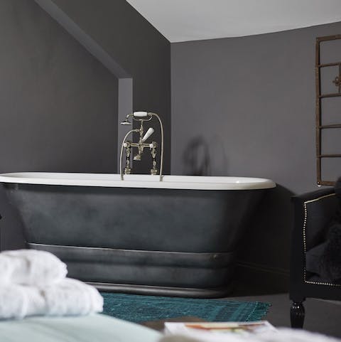 Relax in the master bedroom's freestanding bath