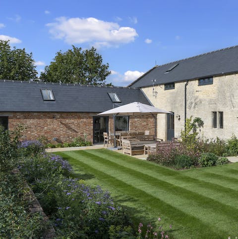 Sit out on the patio in the pretty enclosed garden