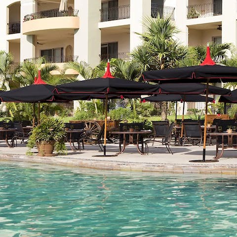 Swim and relax by the communal outdoor pool