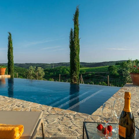 Lounge by the private pool to drink in the views