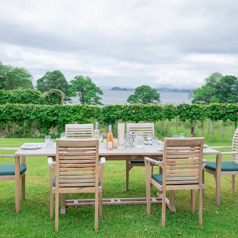 Eat outside on the teak dining table with beautiful views of the Lynn of Lorne