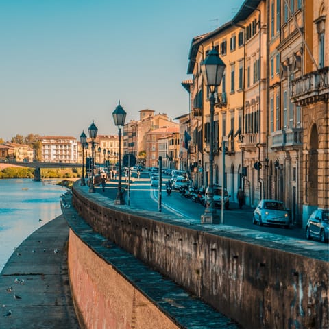 Take a day trip to Pisa to explore the iconic city – it’s not far by car