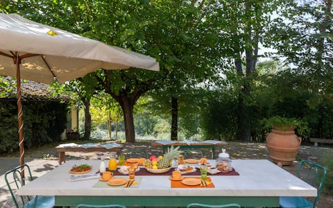 Enjoy long lazy meals cooked with plenty of local produce on the shaded terrace 