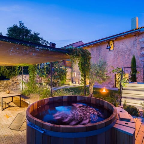 Take a long, luxurious soak in the hot tub under the stars