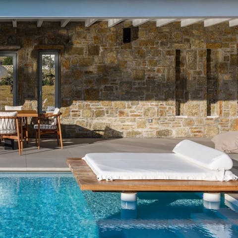 Lounge by the pool or take refreshing dips in its glistening waters 