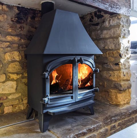 Make yourself cosy and comfortable in front of the wood-burning stove, after a leisurely countryside walk 