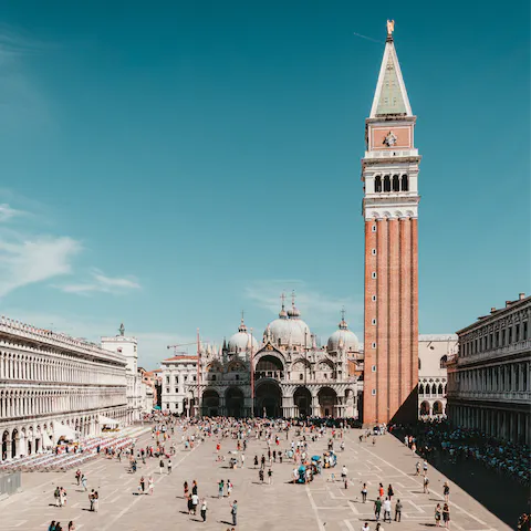 Stroll down to the grandiose and lively St Mark's Square