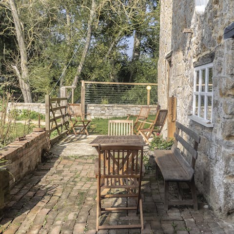 Soak up the late-summer sunshine on the patio and listen out for farmyard noises