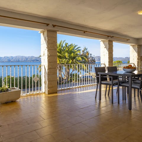 Share delicious alfresco meals on the terrace, with breathtaking views of the Pollensa bay