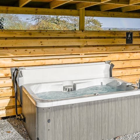 Soak in the hot tub all night long under the starry skies