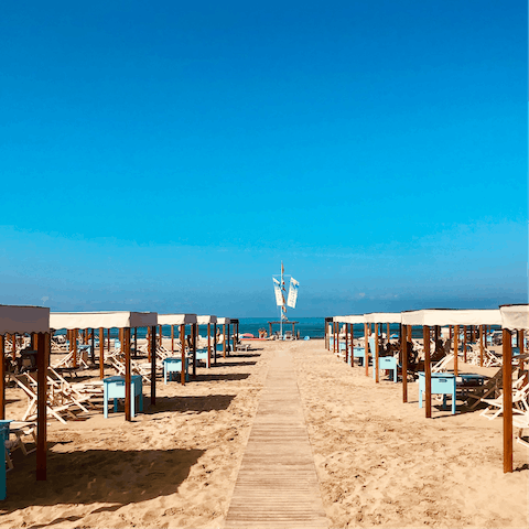 Drive eight minutes to Spiaggia Libera Viareggio and sprawl out on the sandy beach