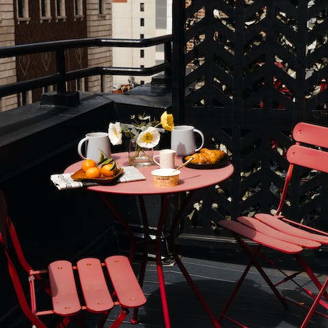 Start your mornings with coffee on the private balcony