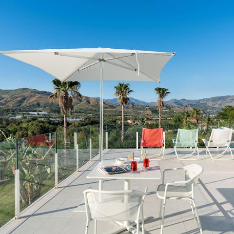 Sip an Aperol Spritz up on the roof terrace