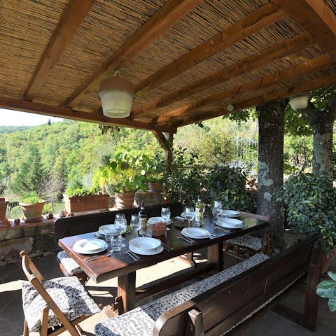Sip Chianti over a meal on the covered terrace