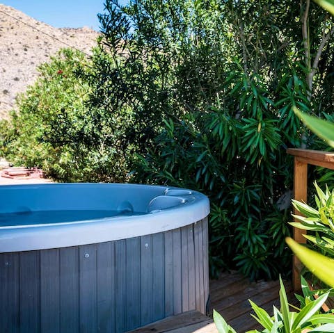 Relax and soak in the private hot tub