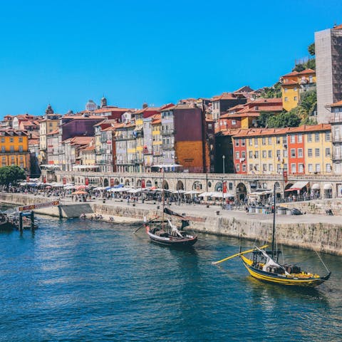 Head down to the waterfront and explore the beautiful Cais da Ribeira