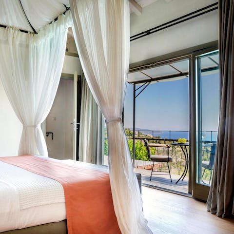 Step right out to the sun-soaked balcony after waking up in a four-poster bed