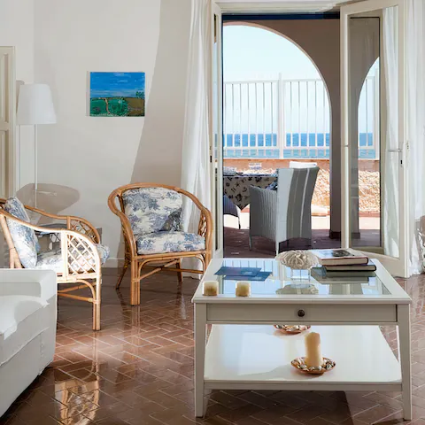 Admire the picturesque ocean views out of the balcony doors