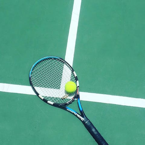 Play a few games of tennis out on the courts