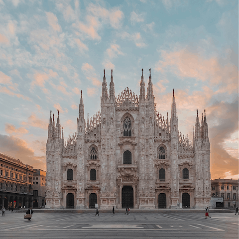 Admire the architecture of the Duomo di Milano – it's within walking distance