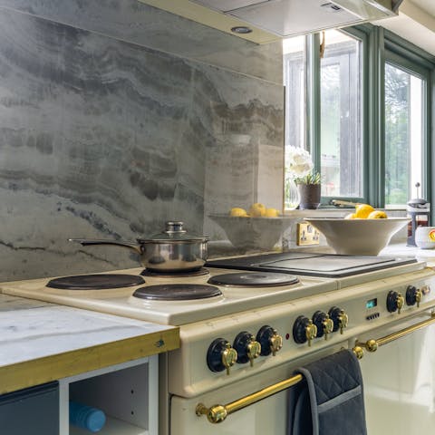 Cook up your favourite dishes in the stylish kitchen