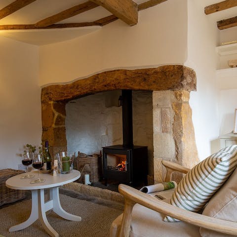Settle down in the snug to enjoy the warmth of the wood burner