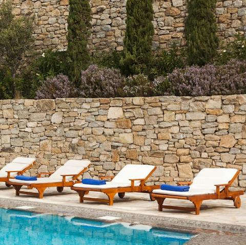 Soak up those balmy rays from plush sun loungers