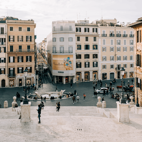 Stroll down the Spanish Steps to one of the main piazzas