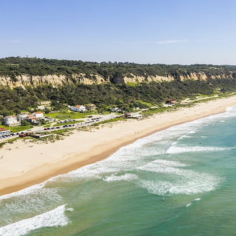 Grab a towel and head to Praia Fonte da Telha beach, 3km away