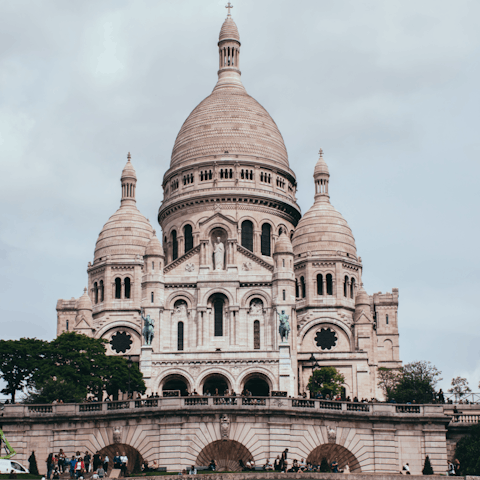 Visit Sacré-Cœur and take in sweeping views of Paris – just a ten-minute walk away