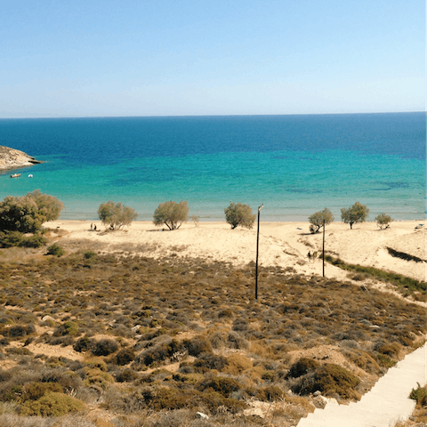 Soak up the Greek sunshine on Agios Prokopios Beach, a twenty-minute walk away
