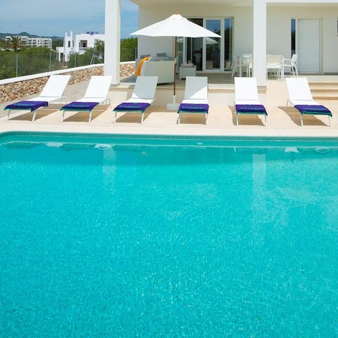 Relax on a lounger by the pool, in the sun or shade