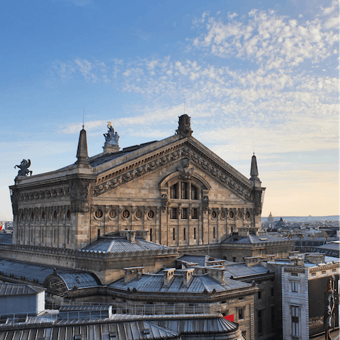 Admire the grandeur of Paris' famous Opéra Garnier, a fifteen-minute stroll from your door