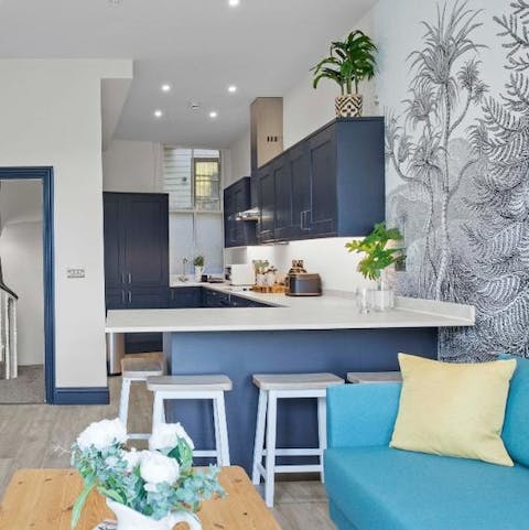 Prepare meals together in the kitchen, chatting around the breakfast bar