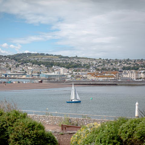 Stroll around Torquay Harbour, less than a one-minute walk away