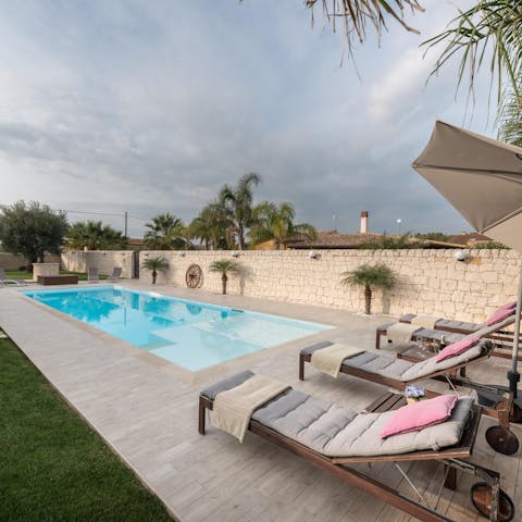 Start your day sunbathing by the private pool, before driving 8 kilometres to Ispica