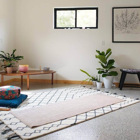Spend some quiet time in the home's yoga room or work out in the small gym