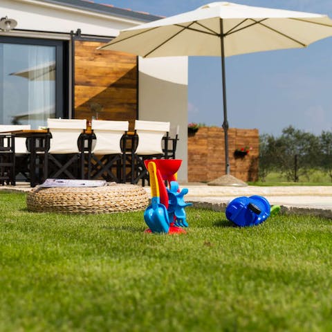 Keep the kids entertained with the children's toys in the garden and a Playstation 4 inside