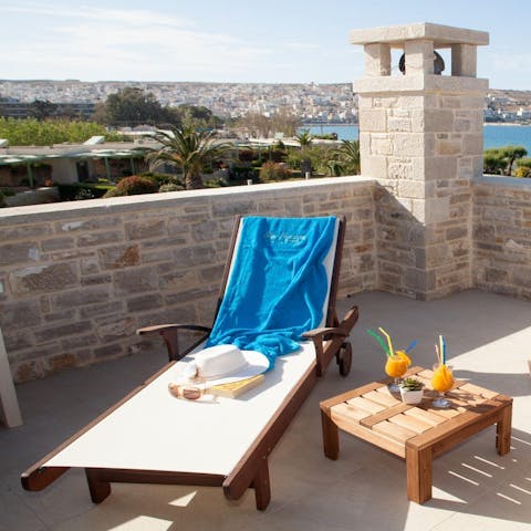 Enjoy views of Sitia from your radiant roof terrace